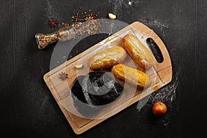 Fresh wheat white bread on a cutting board