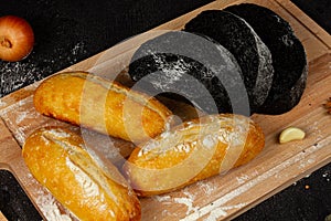 Fresh wheat white bread on a cutting board