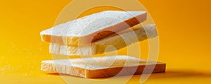 Fresh White Bread Slices Floating Against Vibrant Yellow Background Perfect for Nutrition, Bakery, and Food Concepts