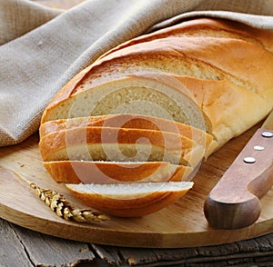 Fresh white loaf of bread photo