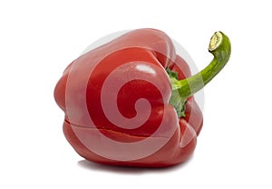 Fresh whole bell peppers isolated on white background. Paprika with a crack.