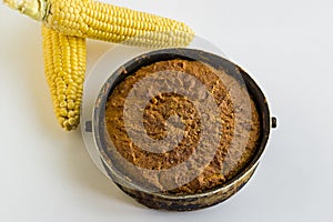 Fresh,whole of cornbread on the white surface with corns