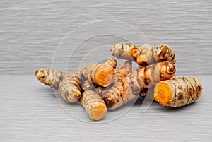 Fresh whole and cut tumeric