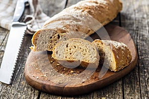Fresh whole grain bread baguette photo