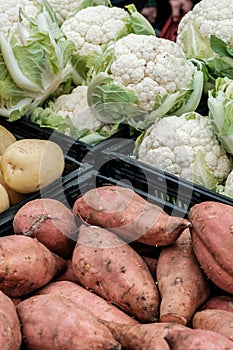 Fresh Whole Raw Uncooked Sweet Potatoes And Cauliflower Vegetables