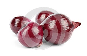Fresh whole red onions on white