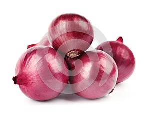 Fresh whole red onions on white