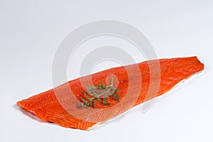 Fresh Whole Salmon Fillet on White Background with Dill