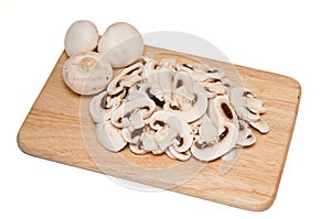 Fresh whole and sliced mushrooms