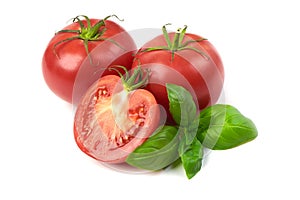 Fresh whole tomatoes and half with basil leaf, isolated on white background. Close-up