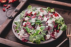 Fresh winter salad with pomegranate seeds