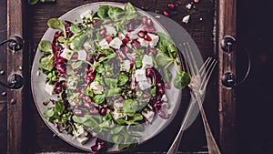 Fresh winter salad with pomegranate seeds