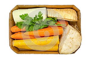 Fresh winter soup pack, uncut and prepacked, in cardboard tray, from above