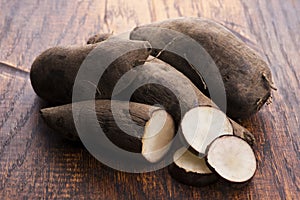 Fresh Yacon roots on wooden background