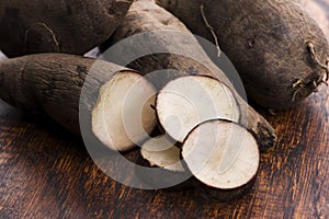 Fresh Yacon roots on wooden background