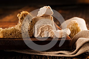 Fresh yeast on wooden background