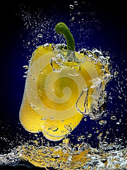 Fresh yellow Bell Pepper Splash in Water