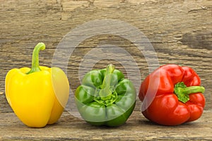 Fresh yellow, green and red bell peppers