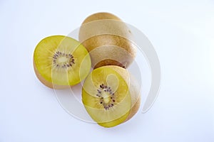Fresh yellow kiwi sliced on white background
