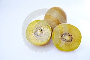 Fresh yellow kiwi sliced on white background