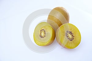 Fresh yellow kiwi sliced on white background