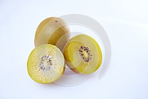 Fresh yellow kiwi sliced on white background