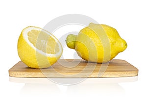 Fresh yellow lemon isolated on white