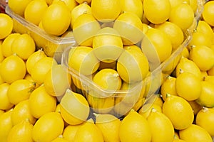Fresh yellow lemon in vegetable shop