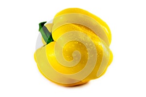 Fresh yellow paprika isolated on white. Healthy eating concept.