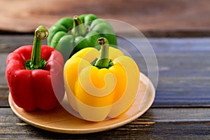 Fresh yellow, red and green bell peppers