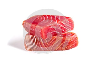 fresh yellowfin sliced tuna steak isolated on a white background. bluefin tuna medallions