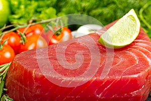 fresh yellowfin sliced tuna steak texture. bluefin tuna medallions with lime