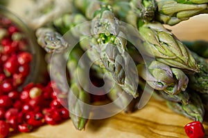 Fresh Young Asparagus closeup. Asparagus on wood board