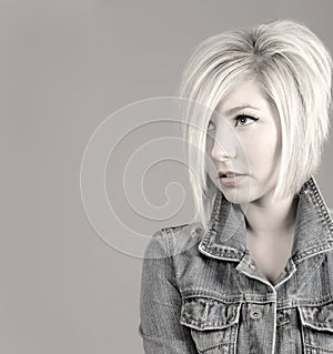 Fresh young girl with trendy hairstyle