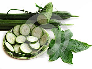 Fresh zucchini, Green vegetables, leaves and zucchini sliced in