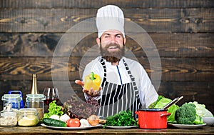 Freshest possible ingredients. Organic food. Fresh ingredients only. Vegetarian meal. Man bearded hipster cooking fresh