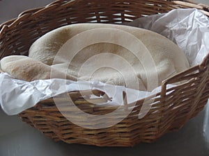 Freshly baked Arabic bread in a basket