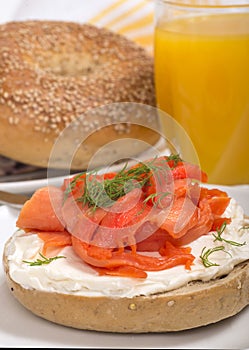 Freshly baked bagel with cream cheese and lox