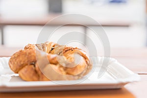 Freshly baked bagel on a plate in the morning