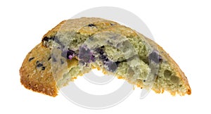 Freshly baked blueberry muffin top broken in half