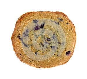 Freshly baked blueberry muffin top on a white background