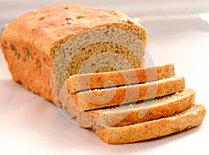 Freshly baked bread cut into loaf