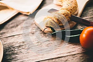 Freshly baked bread is cut into pieces