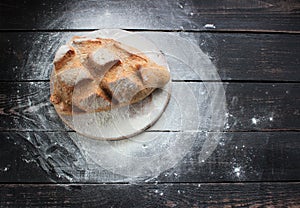 Freshly baked bread on a cutting board