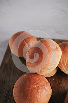 Freshly baked bread. Organic whole-wheat loaves on white background.