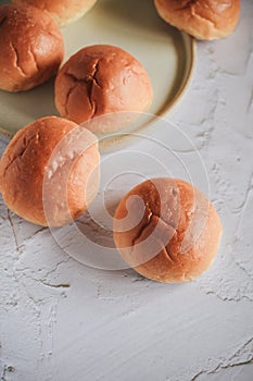 Freshly baked bread. Organic whole-wheat loaves on white background.