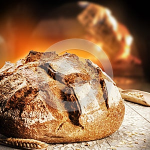 Freshly baked bread in rustic bakery with traditional oven photo