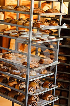 Freshly baked breads and buns at bakery house dough preparation