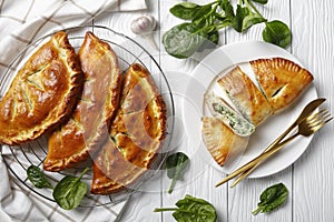 Freshly baked calzones with Spinach and Cheese