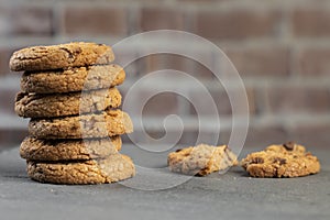 Freshly baked Chocolate chip cookies on a stone table with place for text